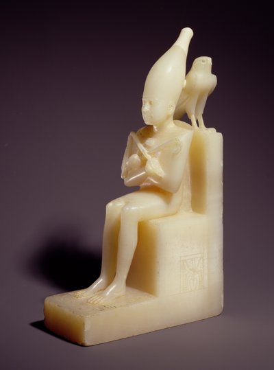 Small seated statuette of Pepi I with Horus Falcon by Old Kingdom Egyptian
